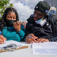 Residents of the Flatbush neighborhood of the Brooklyn borough of New York register to vote at a voter registration event on Sept. 29, 2021.